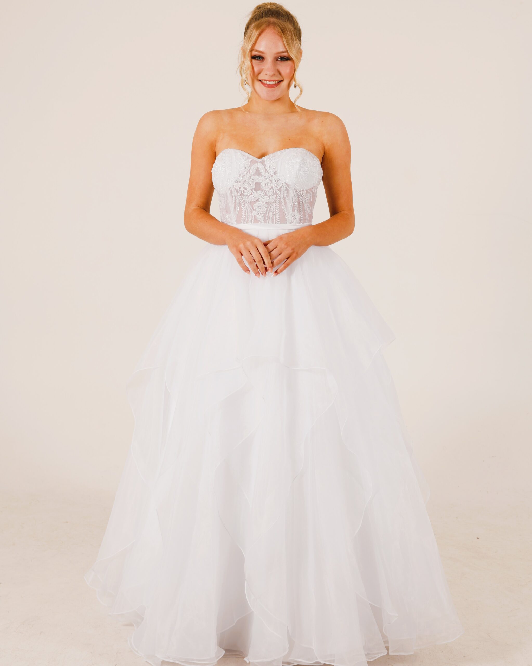 Lace bodice with waterfall skirt in organza